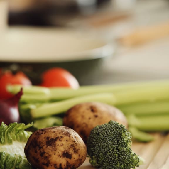 Raw vegetables on a wooden board