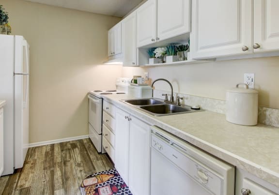 the preserve at ballantyne commons apartment kitchen with white cabinets