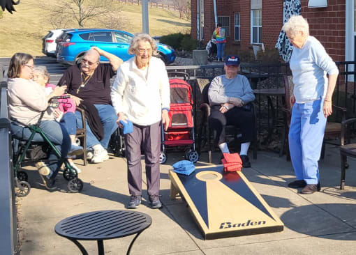 Residents enjoying outdoors at Elison Independent and Assisted Living of Maplewood