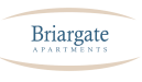 the logo of brigade apartments on a black background