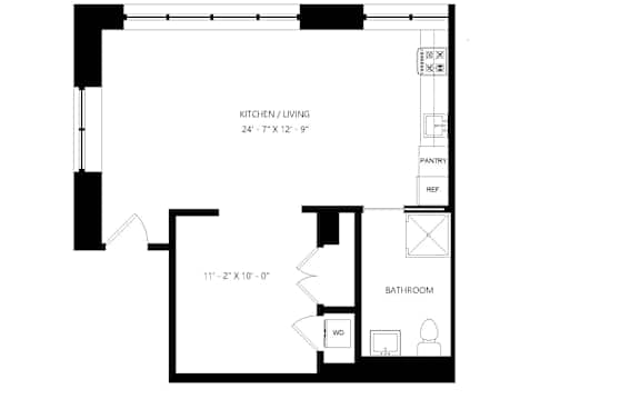 A floor plan for a Studio Alcove with a bathroom.