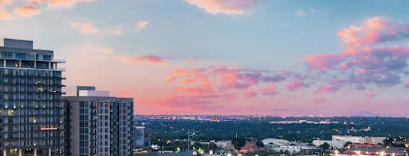 Aerial view of the city at sunset at The Heights at Park Lane, Dallas, TX, 75231