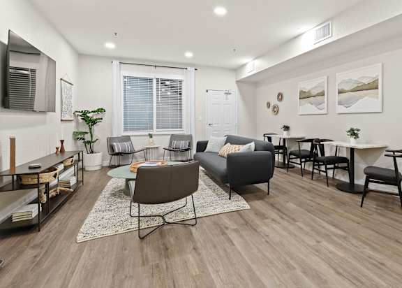 Seating area in newly renovated clubroom at Switchback on Platte Apartments, Littleton, 80120