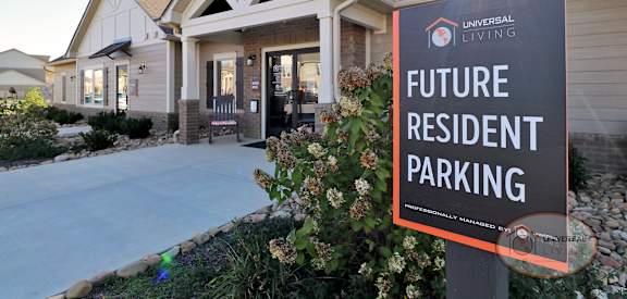 a future resident parking sign in front of a house