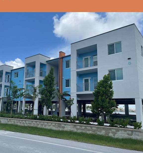 A modern apartment complex is advertising that Quarry 3 is now open with limited availability and encourages to apply today.