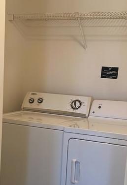 a white washer and dryer in a room