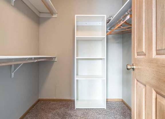 Large walk-in closet with shelving at Southwind Villas in southwest Omaha in La Vista, NE, 68128