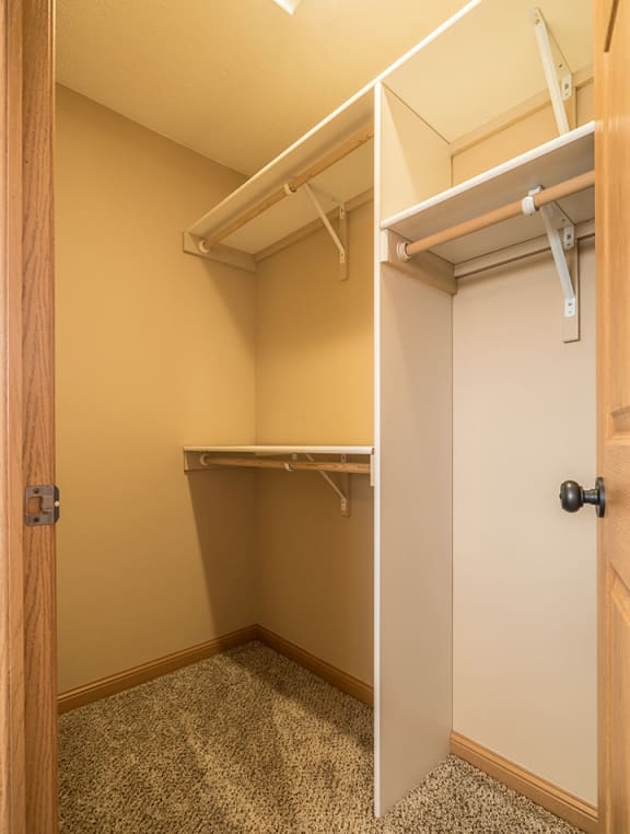 Large closet with lots of storage space and shelving at Grand Legacy Aparmtnets