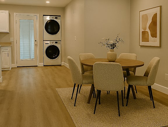 A dining room with a table set for six.