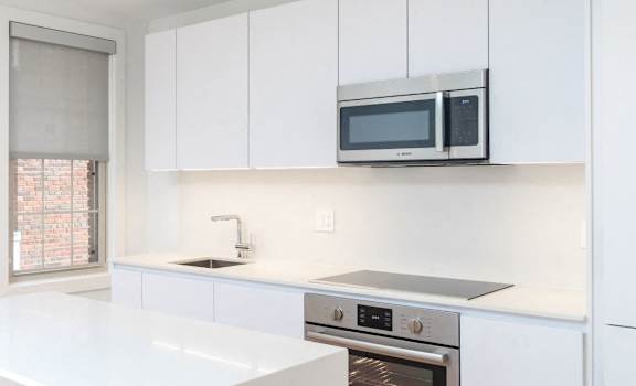 Kitchen with luxury Bosch appliances and a dishwasher