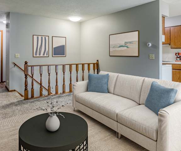 a living room with a couch and a coffee table