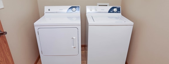a washer and dryer in the laundry room
