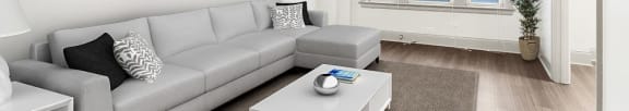 a living room with a couch and a coffee table