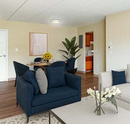 A living room with a blue couch and a white couch  at Edmands House, Massachusetts, 01701