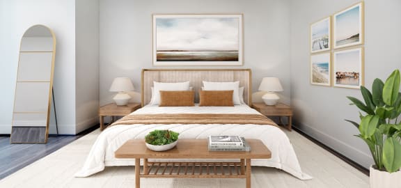 a bedroom with a bed and a table