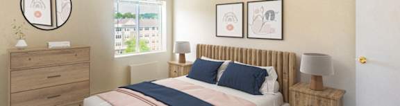 A bedroom with a bed, nightstand, and two framed pictures on the wall at Edmands House, Framingham, 01701