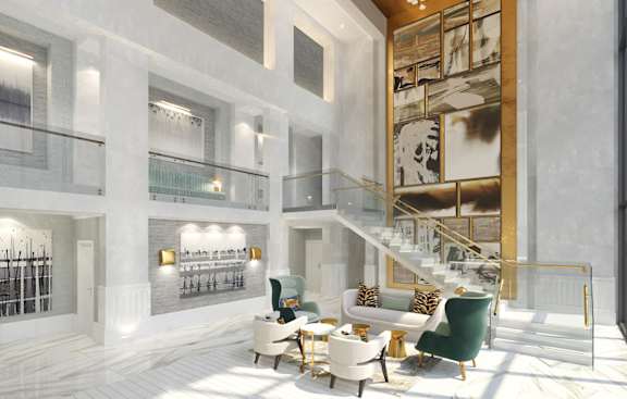 a rendering of a lobby with a staircase and tables and chairs
