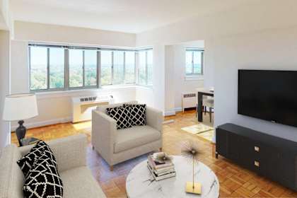 a living room with a couch and a tv