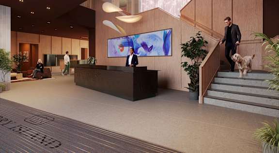 A reception area with a receptionist and a dog.