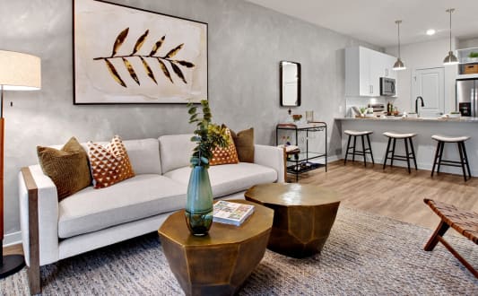 a living room with a couch and a table