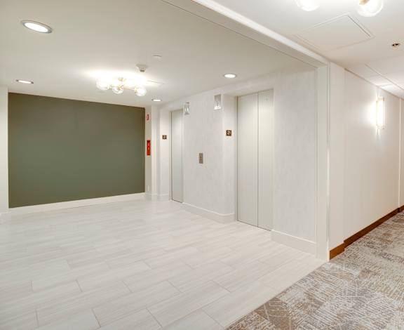 Newly renovated elevator lobby at Lenox Club Apartments located in the National Landing neighborhood in Arlington, VA 22202