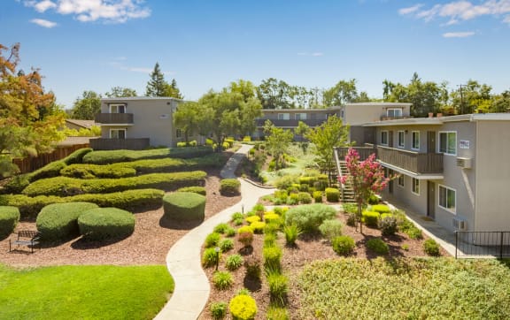 a balcony with a table and chairs and a view of the beach  at Pleasanton Heights, California