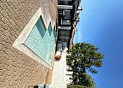 Thumbnail 43 of 44 - a view of a kiddie pool and sitting area at The Bryant Apartments at Yorba Linda, Yorba Linda