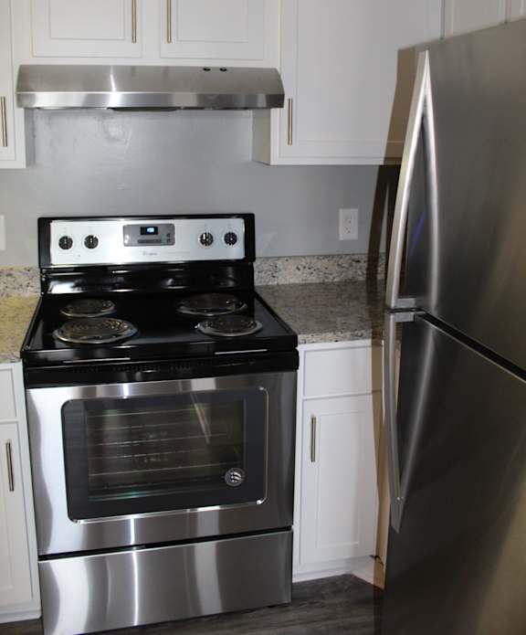 Stainless steel appliances at The Avery at Auburn Apartments in Auburn, AL