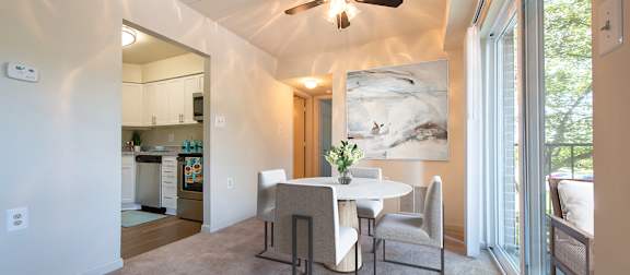 Dining room with ceiling fan1 at Tuscarora Creek, Leesburg, Virginia