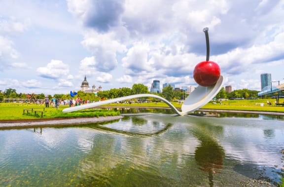 a sculpture of a spoon with a cherry on top of it at The Park Apartments in Minneapolis, MN