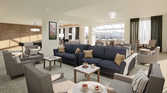 A living room filled with furniture and a large window