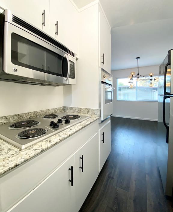 Kitchen with Stove Top and Microwave  at 2120 Valerga, in Belmont, California, 94002