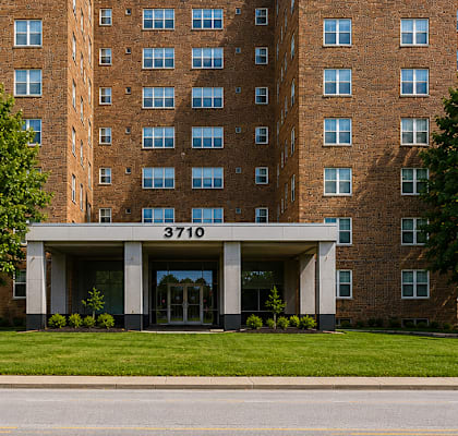 A large brick building with the number 3710 on the front.