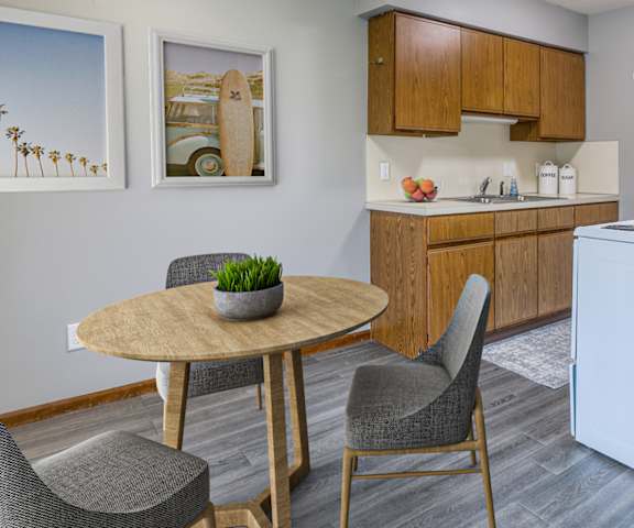 a kitchen and dining area in a 555 waverly unit