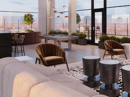 A modern living room with a large window overlooking the city.