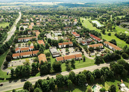 A bird's eye view of a residential area with houses and greenery. at Quail Ridge, Plainsboro Township, NJ, 08536