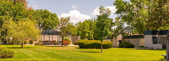 a house with a large lawn in front of it