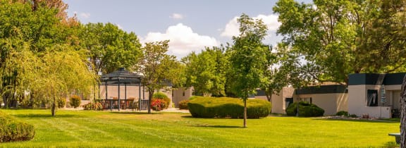 a house with a large lawn in front of it