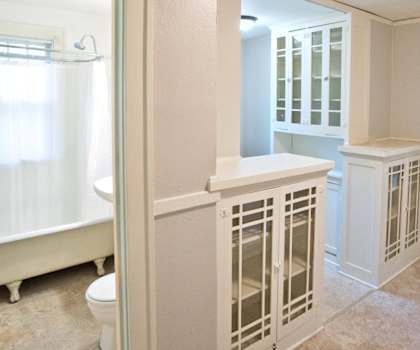 a bathroom with a tub and a sink