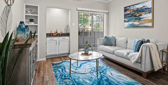 Livingroom with couch and built in shelving