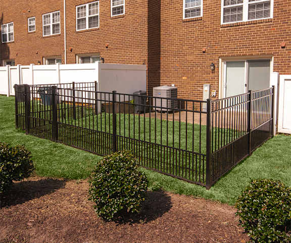 an image of a fence in front of a building