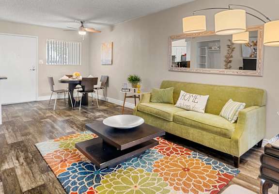 One bedroom Living room and dining area at Villa Toscana Apartments in Phoenix Arizona