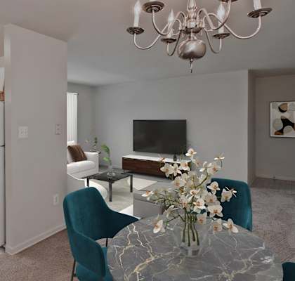 A kitchen with a refrigerator, oven, and sink. at Dulles Glen Apartments, Virginia