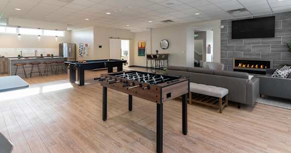 Lounge With Foosball Table at G17 Apartments at Tamarack, Edmonton