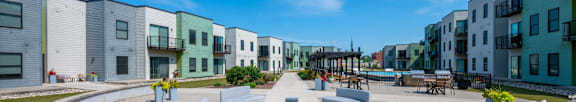 A sunny day at a modern residential area with a central courtyard.