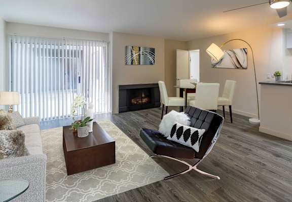 Furnished dining area with kitchen and balconyth view of kitchen