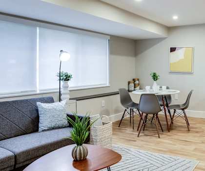 Spacious open concept living room with hardwood floors