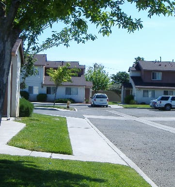 Image of street next to apartments