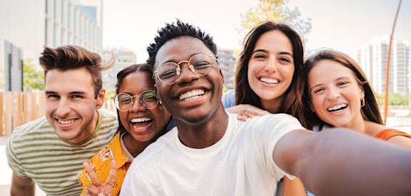 A group of friends taking a selfie together.