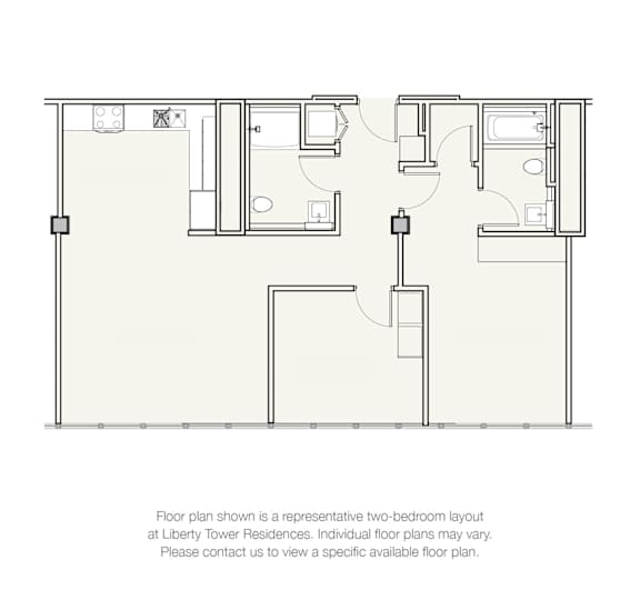 A floor plan for a two-bedroom apartment at Liberty Tower Residences is displayed.